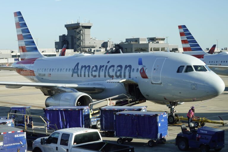 American Airlines plane catches fire at Denver airport, sending 12 people to the hospital